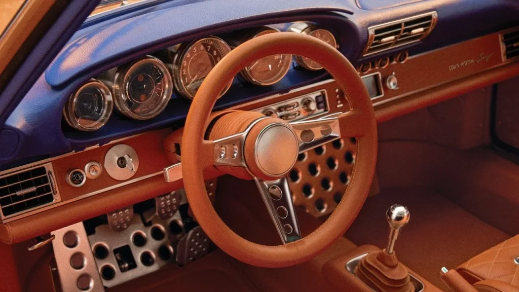 Singer and Louis Vuitton unveil two bespoke Porsche 911s featuring a detachable timepiece inspired by the iconic Tambour watch