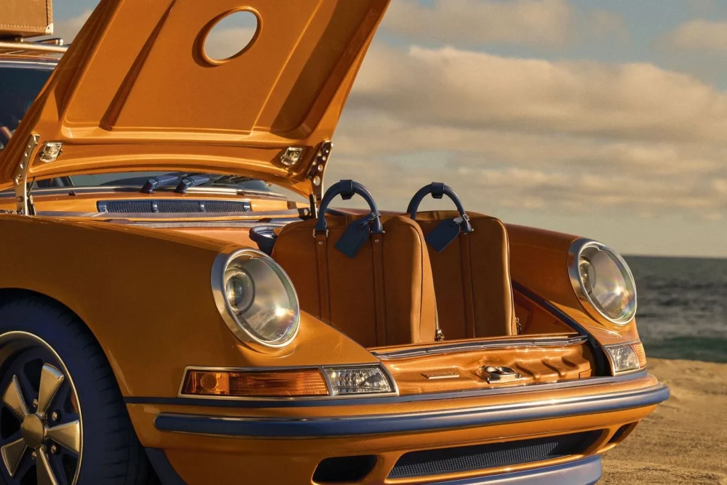 Singer and Louis Vuitton unveil two bespoke Porsche 911s featuring a detachable timepiece inspired by the iconic Tambour watch