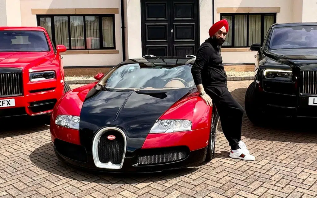 Reuben Singh with his four world record Bugatti cars.