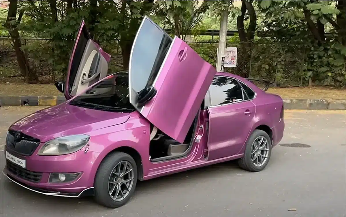 Man fits Skoda Rapid with Lambostyle scissor doors