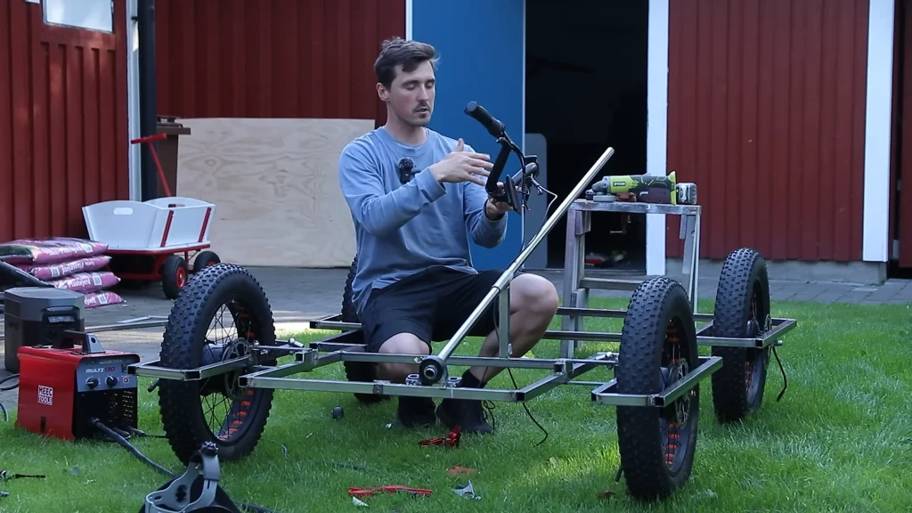 Man builds a solar-powered electric car and travels 18 miles without using up any battery due to the solar energy