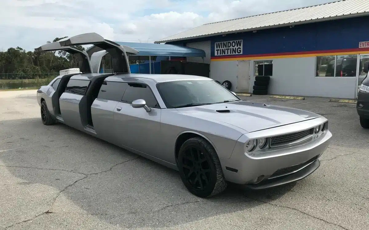 Someone made an over-the-top Dodge Challenger limo with gullwing doors