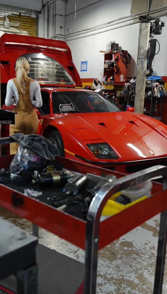 US woman restoring a Ferrari F40 after being inspired by the car from Ghostbusters sends message to all women wanting to get into working on cars