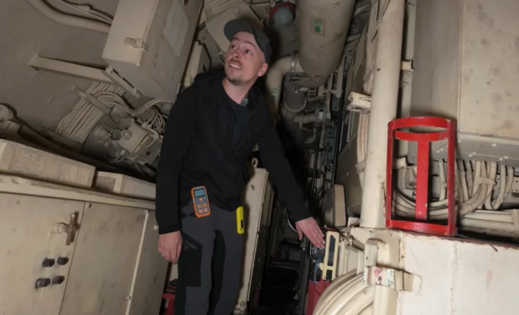 Couple sneak inside an abandoned Soviet-Chinese submarine and what they find is as wild as you'd expect