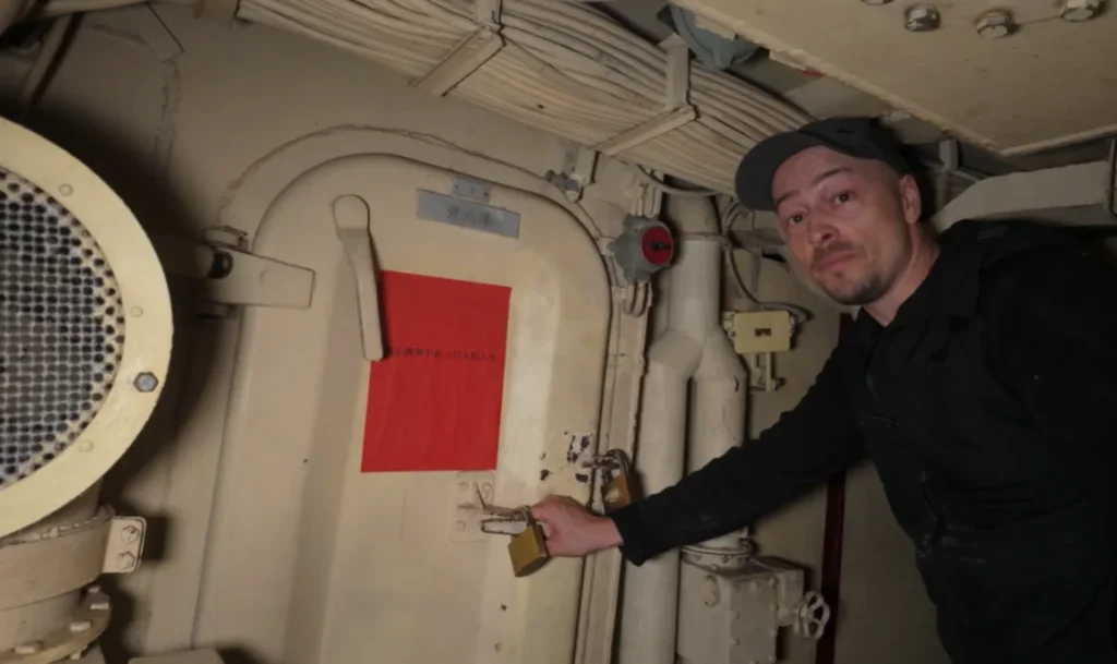 Couple sneak inside an abandoned Soviet-Chinese submarine and what they find is as wild as you'd expect