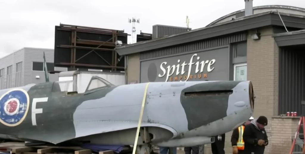 Crane removes iconic Spitfire replica after nearly 30 years in Canada as residents gather to say goodbye