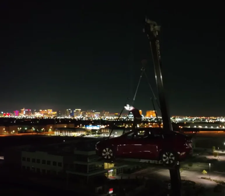 Steve-O craned his Tesla Model Y 120ft in the air outside the UFC HQ in Vegas to live in it and chaos ensued