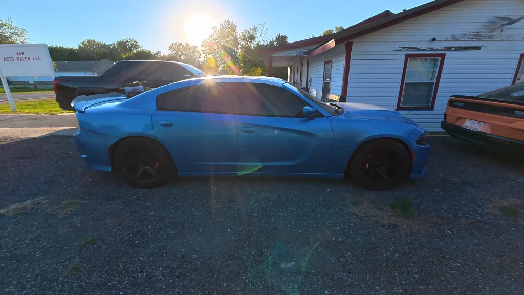 Oklahoma man buys stolen 2015 Dodge Charger R/T at auction for $7,500 and makes surprising cash discovery inside