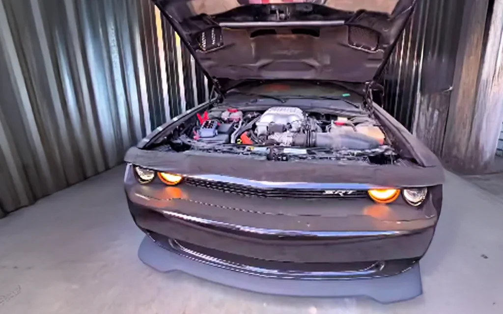 This man from Connecticut revealed a stunning surprise as the door of an abandoned storage unit, bought for $500, was hiding a Dodge Challenger Hellcat