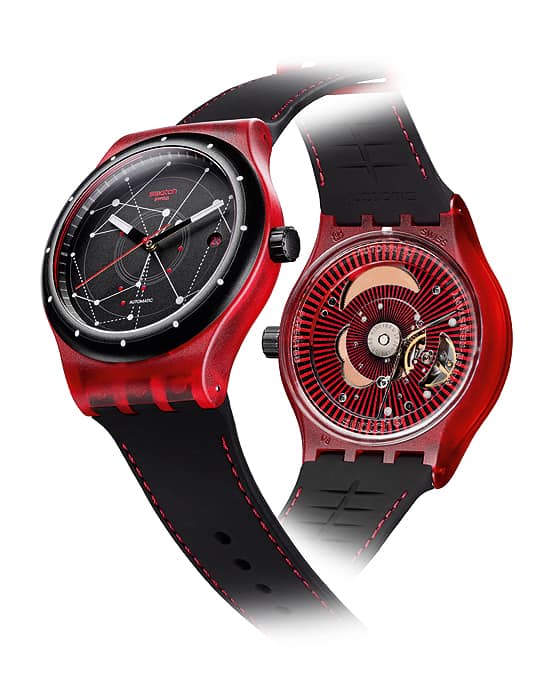 The Swatch Sistem 51 red is pictured.