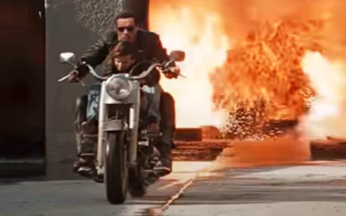 The Terminator with John Connor on his motorbike.