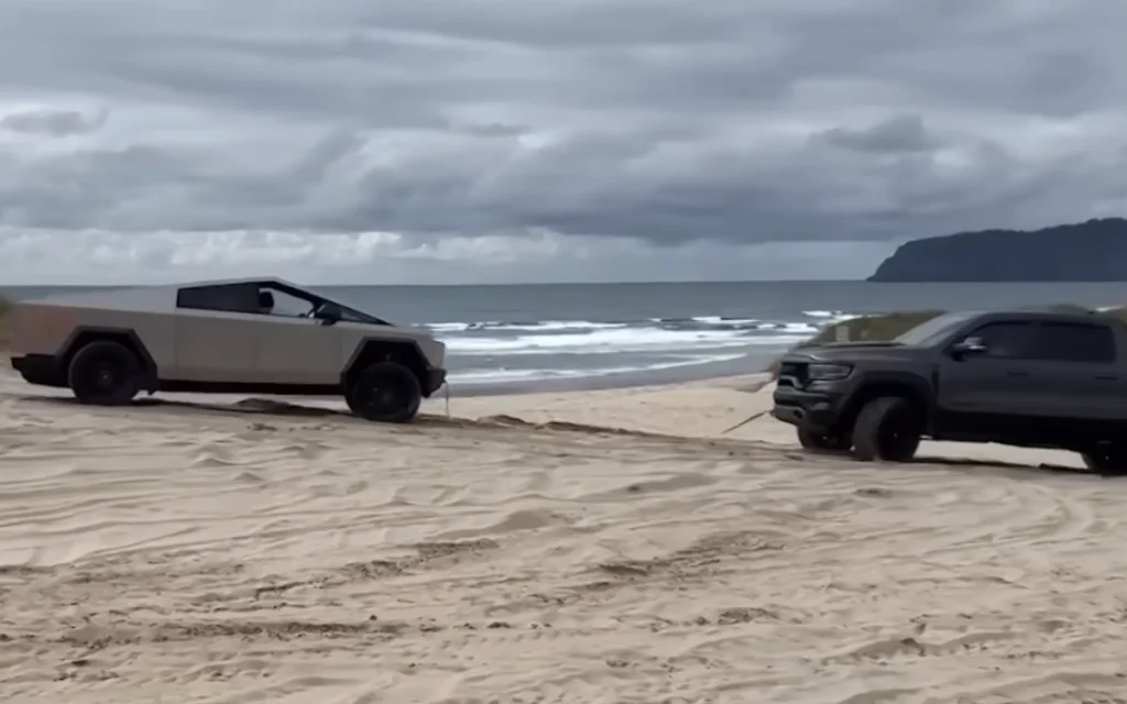 A Dodge Ram truck had to come to the rescue of a Tesla Cybertruck, after it found itself stuck in sand dunes