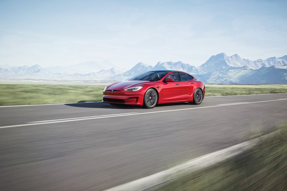 Tesla Model S Plaid driving on road
