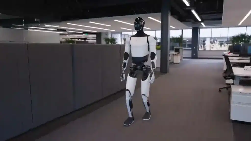 Tesla-Optimus-robot-taking-a-walk-through-the-office