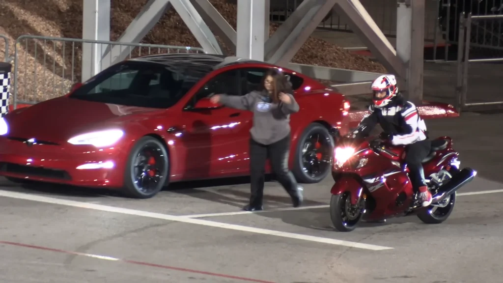 Tesla Model S Plaid EV faces off against Suzuki Hayabusa motorbike in a drag race and it's not even close