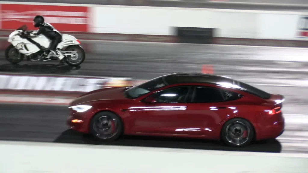 Tesla Model S Plaid EV faces off against Suzuki Hayabusa motorbike in a drag race and it's not even close