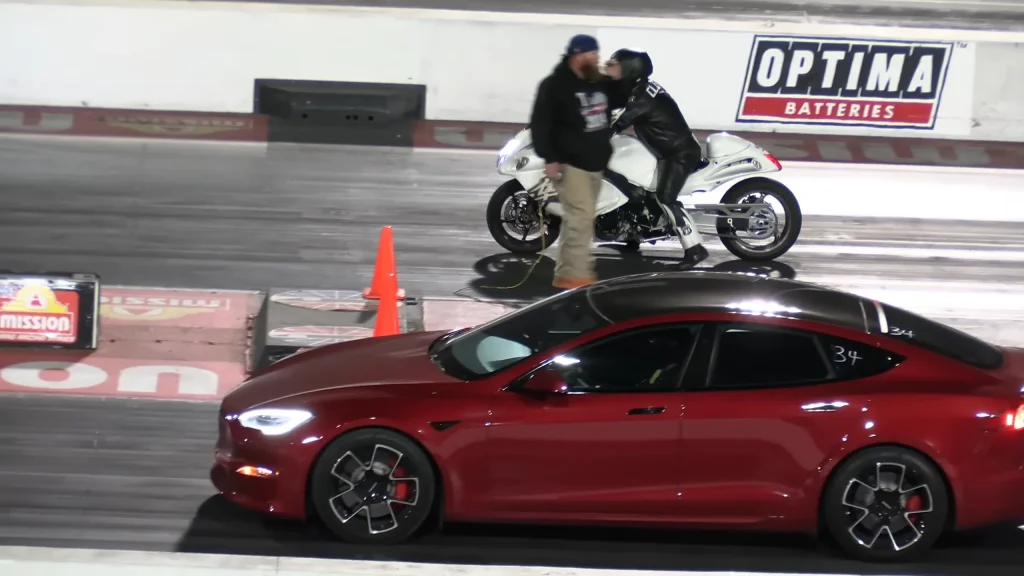 Tesla Model S Plaid EV faces off against Suzuki Hayabusa motorbike in a drag race and it's not even close