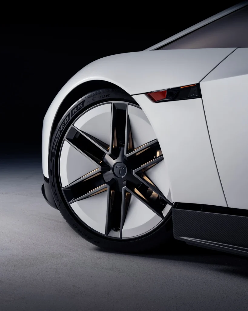 Tesla Roadster is here as the fastest-accelerating production car in the world and the worlds first rocket-assisted production road car side 1
