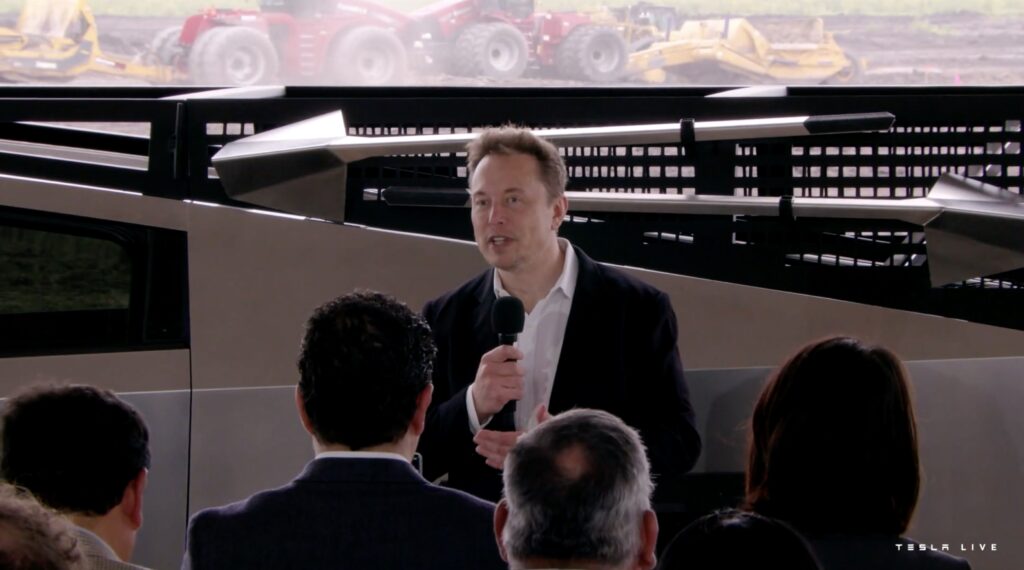 Elon Musk in front of Tesla Cybertruck tool rack
