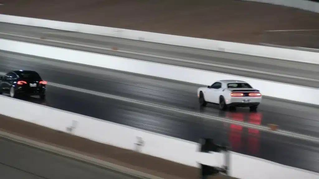 Entry-level Tesla Model 3 EV takes on a Dodge Challenger SRT Hellcat in a drag race and embarasses the muscle car