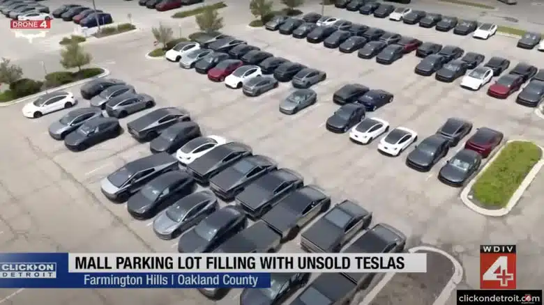 Teslas in a Detroit parking lot, with EVs unsold