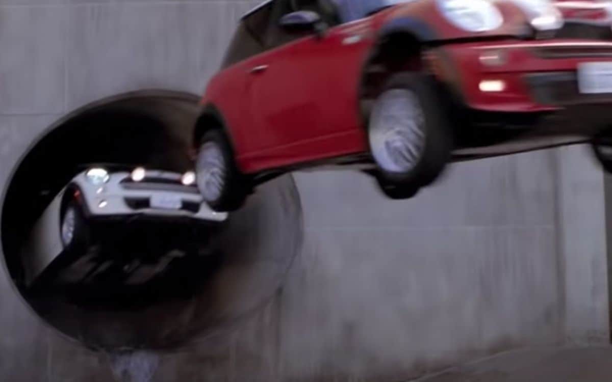 Two Minis leap from a tunnel.