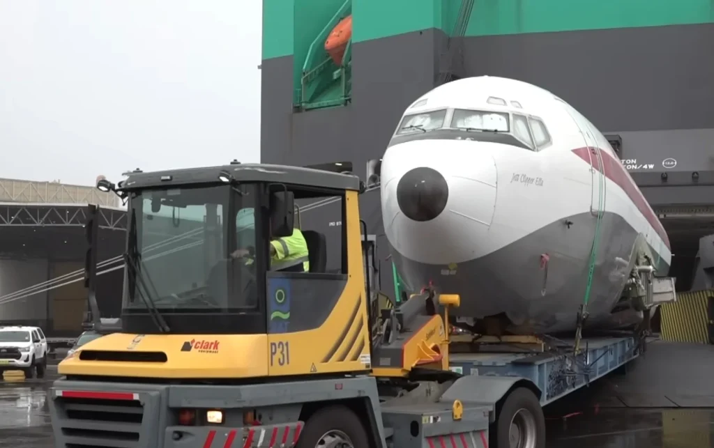 The Qantas Boeing 707 owned by John Travolta has finally landed in Australia