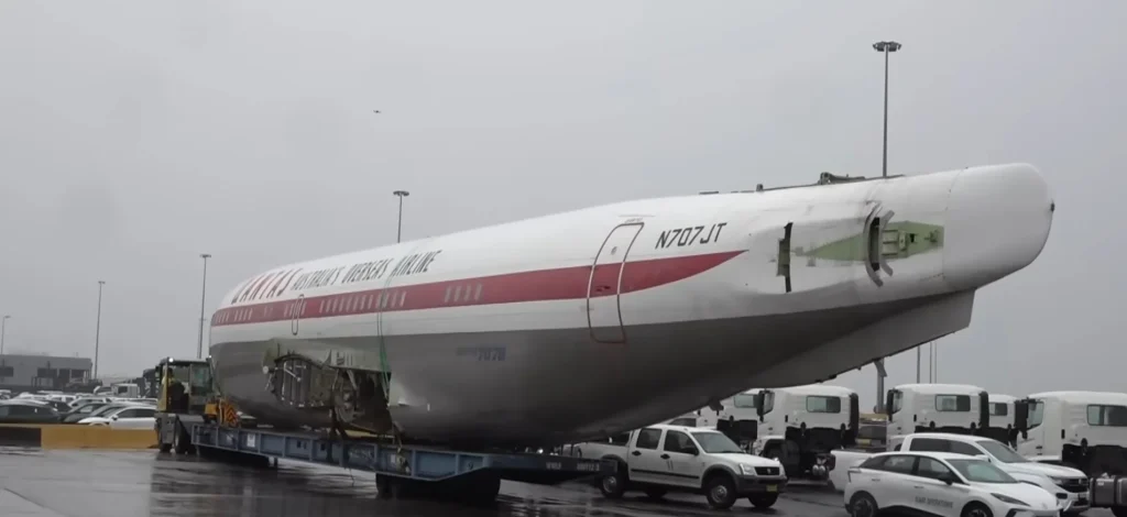 The Qantas Boeing 707 owned by John Travolta has finally landed in Australia