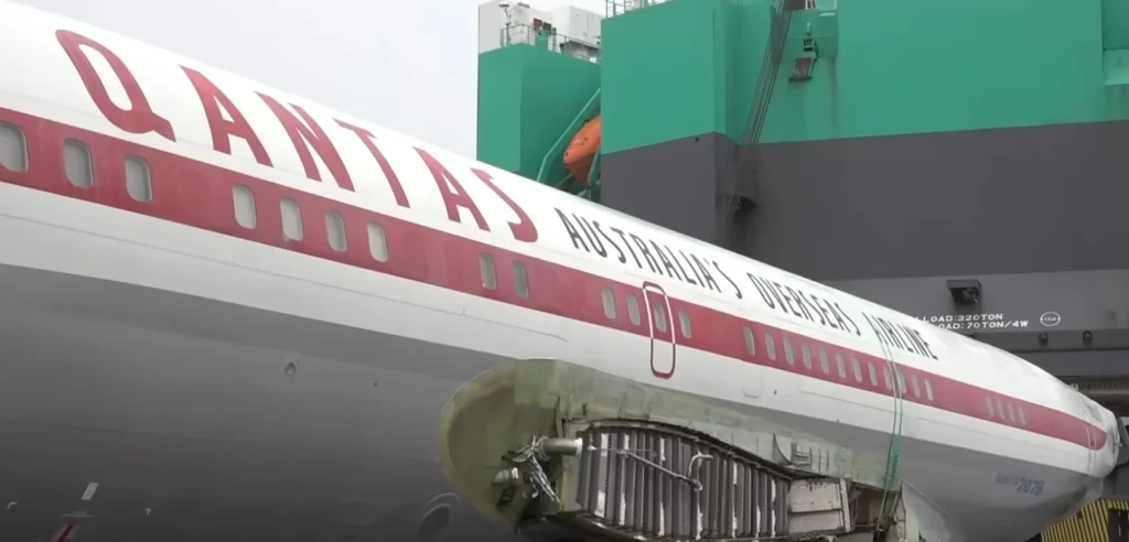The Qantas Boeing 707 owned by John Travolta has finally landed in Australia