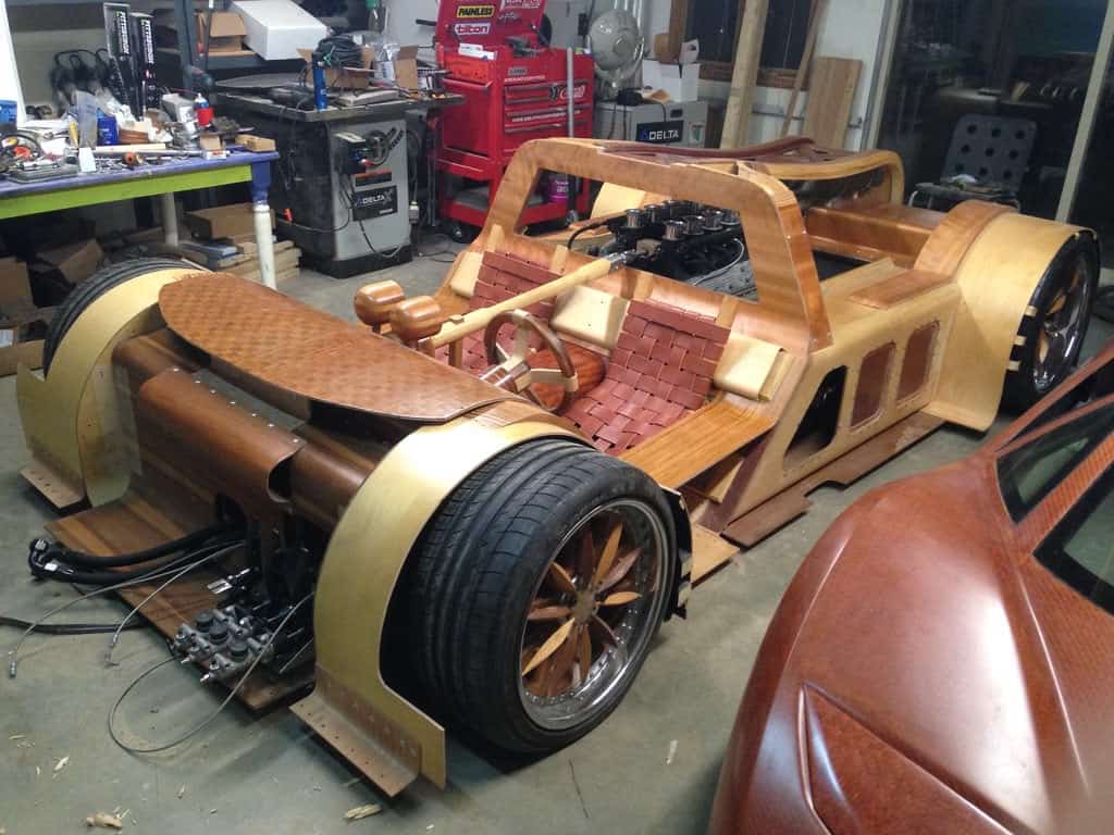 The chassis with wooden seats and steering wheel