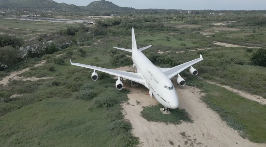There's an abandoned Thai Airways Boeing 747 randomly sitting in a field in Thailand, and the story behind it isn't particularly happy