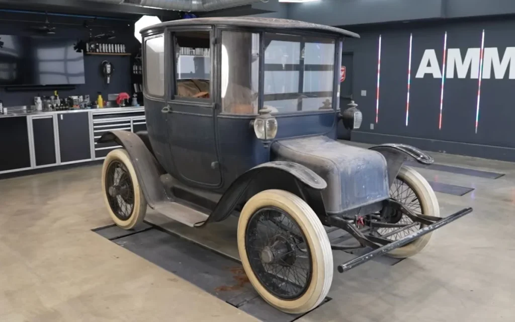 These guys gave a 1914 Detroit Electric car its first wash in 100 years, and it's honestly the coolest thing we've seen today