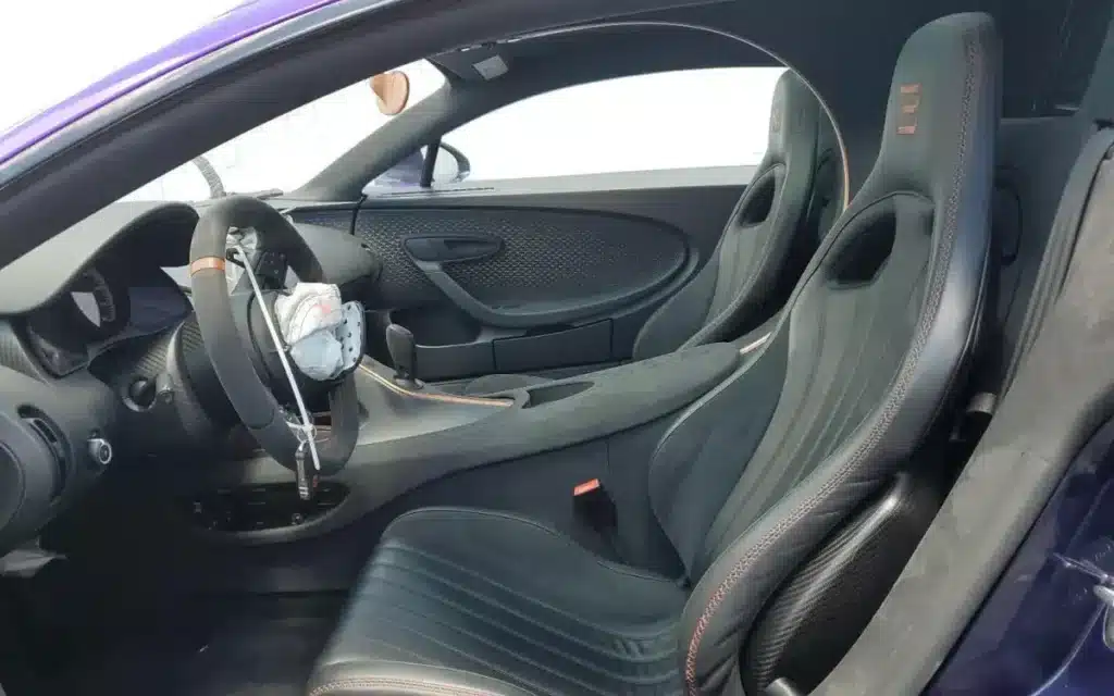 This 24-year-old YouTuber bought a Bugatti Chiron, wrecked it, and now he's selling it