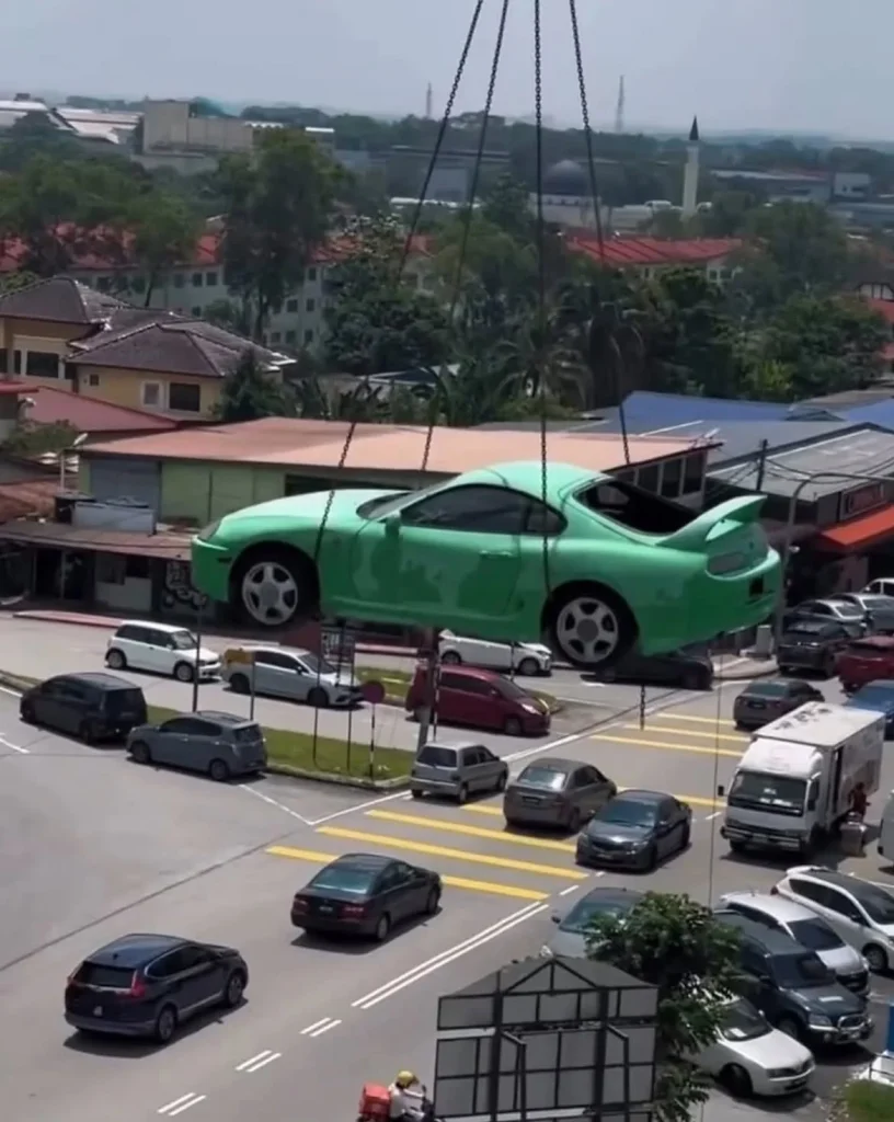 This Toyota Supra spent over 20 years 'living' atop the roof of a dealership in Malaysia