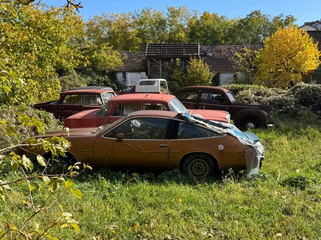 This abandoned car graveyard in Europe is the resting place of a bunch of vehicles that are potentially worth a lot of cash
