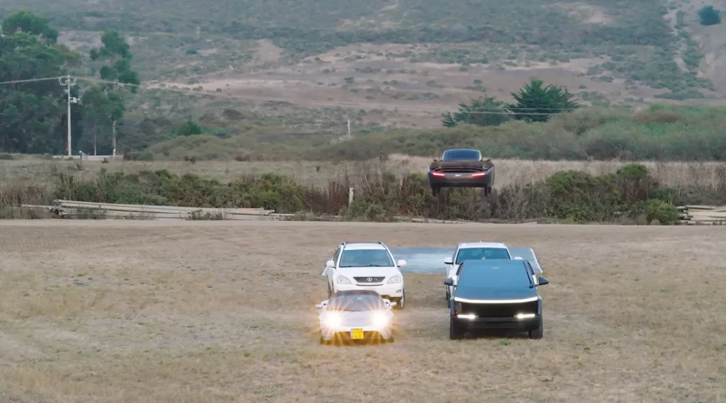 This company responded to the Tesla Roadster unveil by performing an equally impressive stunt flying across multiple Teslas