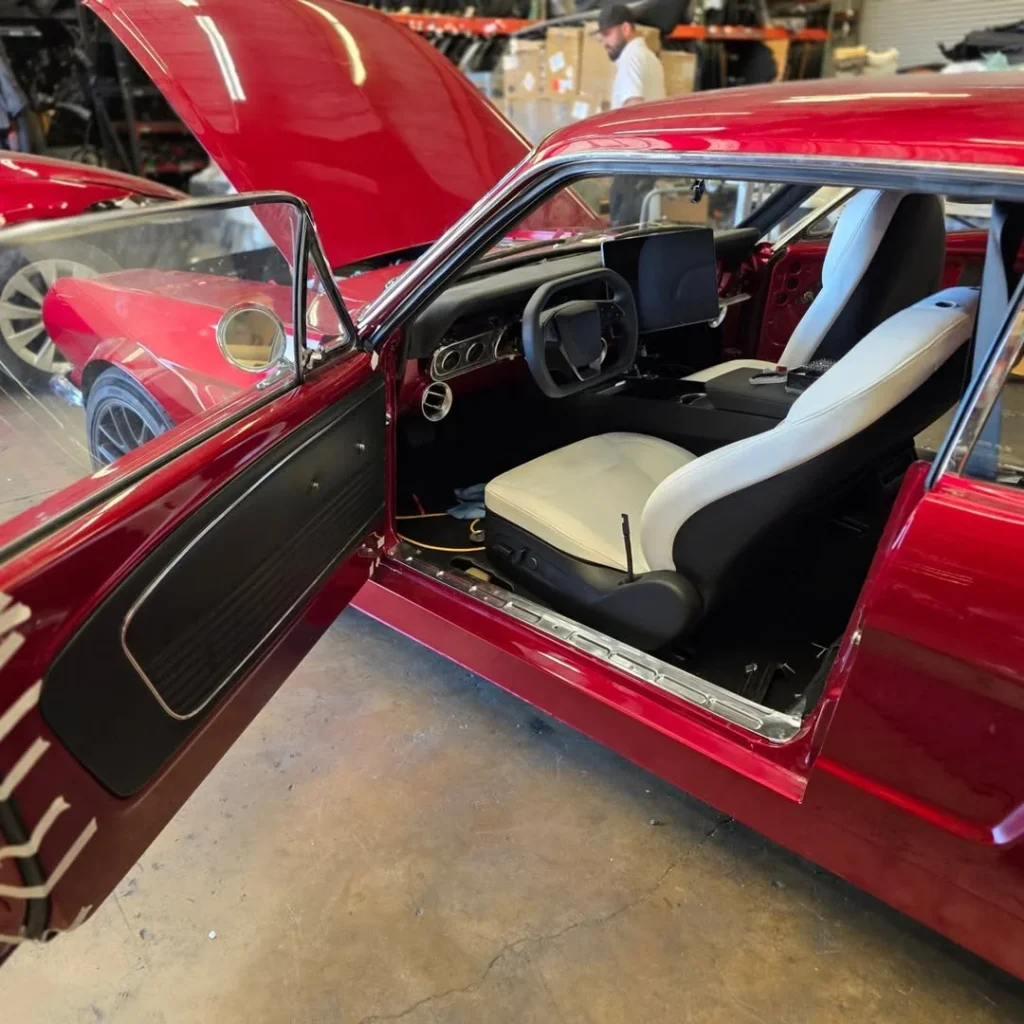 This guy modified a classic 1966 Ford Mustang with an electric motor, which is not unheard of, and then he added Tesla FSD, which is crazy