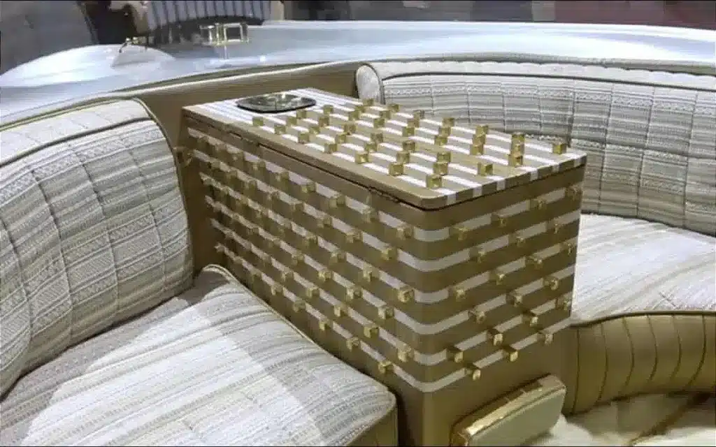 This is the Golden Sahara II, a heavily modified 1953 Lincoln Capri adorned with gold and glowing tires