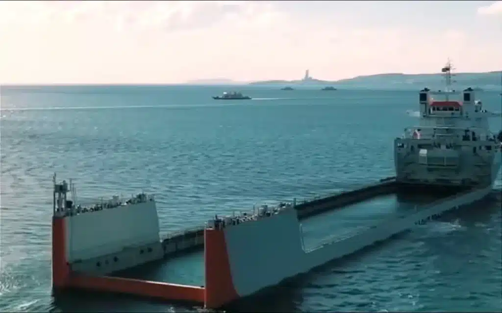 This is a yacht express, a 685-foot semi-submersible ship that carries yachts and superyachts across the Atlantic