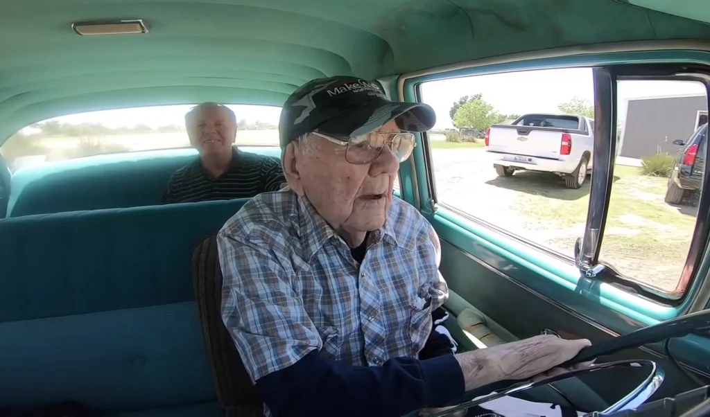 Old man driving his car