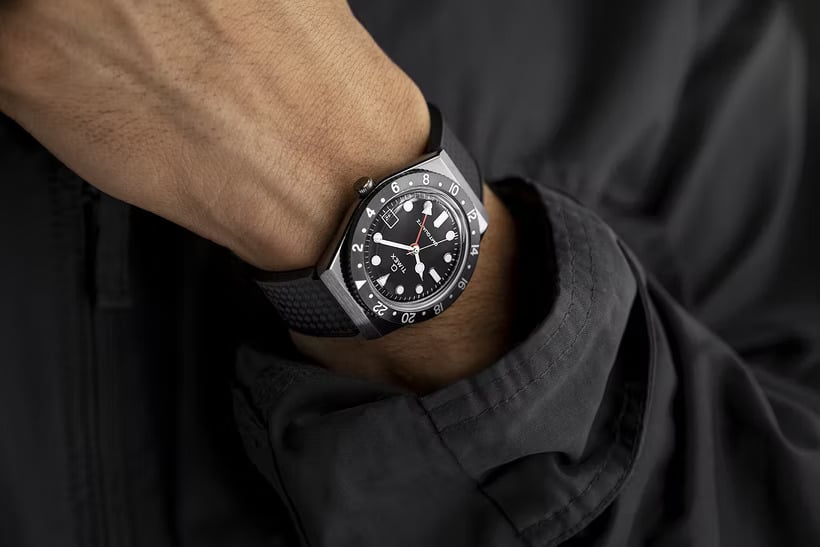 The Timex Q on a man's wrist.