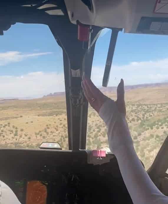 Tourist grabs helicopter lever