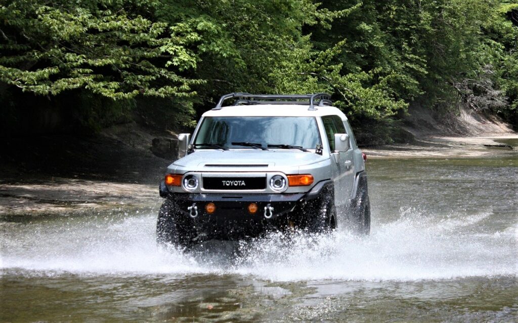 Toyota FJ Cruiser wading through water
