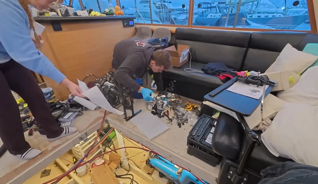 Canada couple try and get their 45ft Bayliner Bodega boat powered by a Toyota Prius to see if they can get it running for free