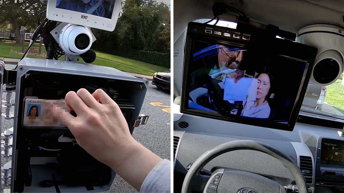 Woman holding license up to traffic stop robot