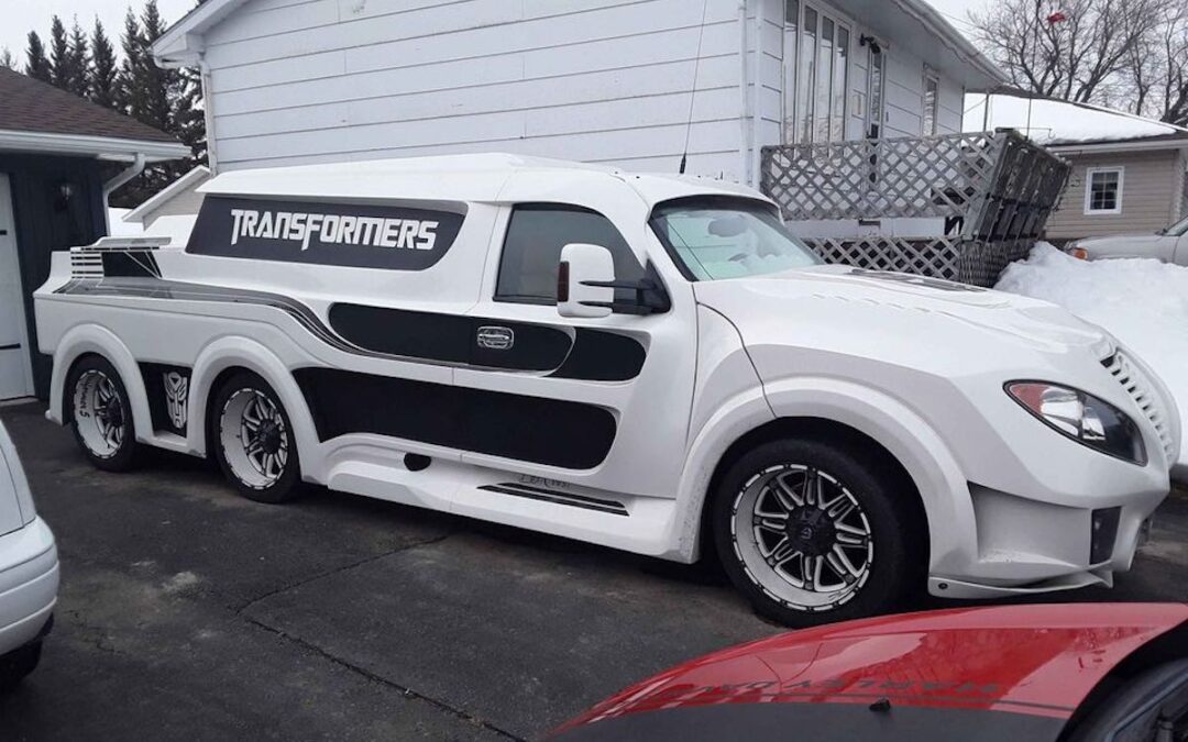This Chevy pickup truck is a wacky six-wheeled Transformers tribute