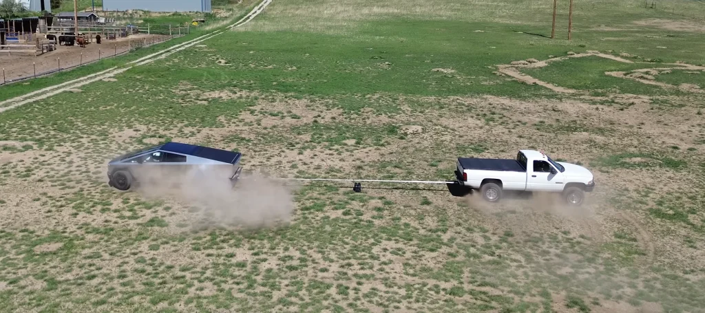 Tesla Cybertruck goes head-to-head with 1990s turbo-diesel Dodge Ram in tug-of-war and the result leaves everyone surprised