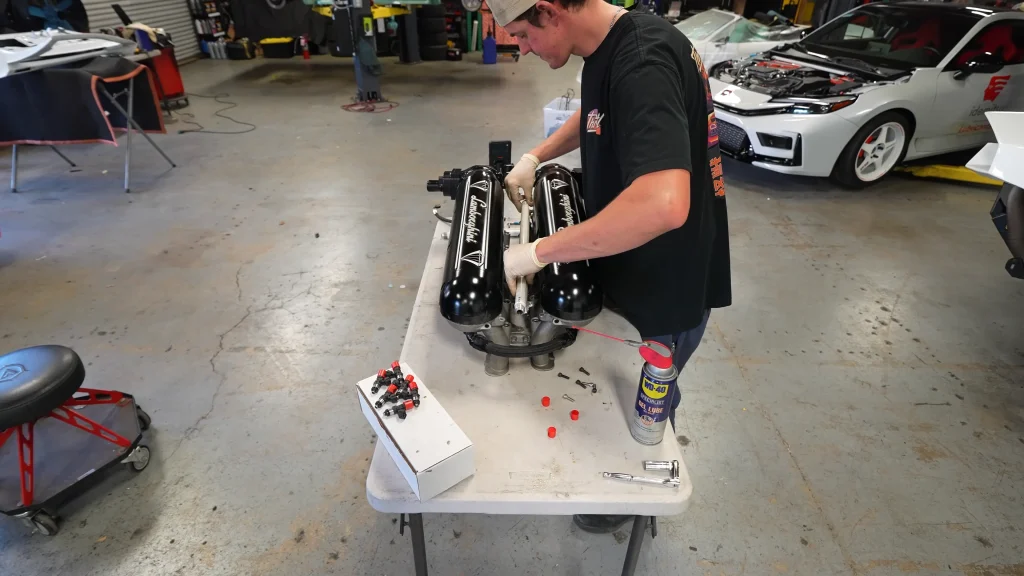 Mechanics install twin turbos on a Lamborghini Murciélago in one of the wildest custom project