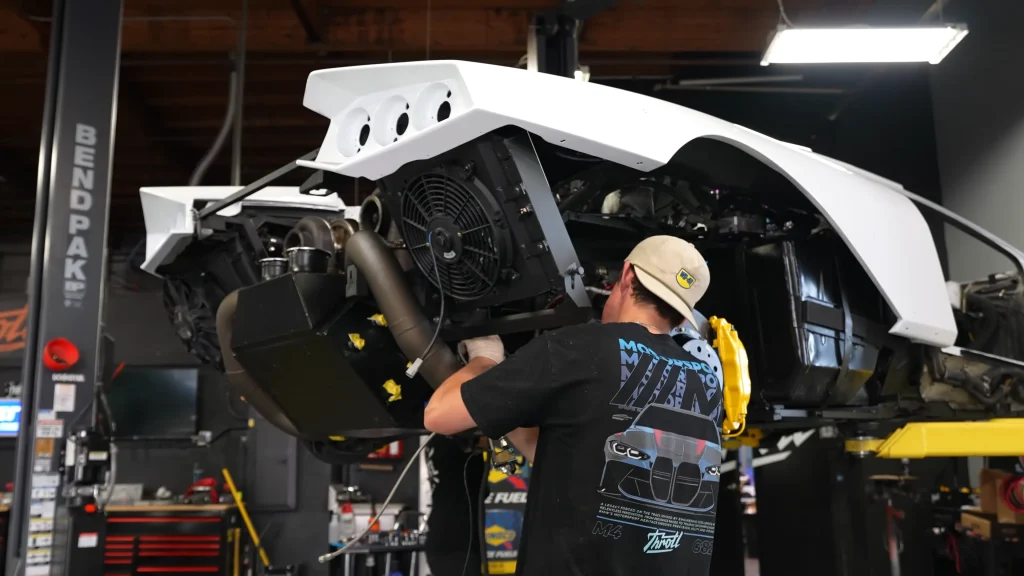 Mechanics install twin turbos on a Lamborghini Murciélago in one of the wildest custom project