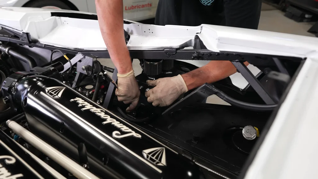 Mechanics install twin turbos on a Lamborghini Murciélago in one of the wildest custom project